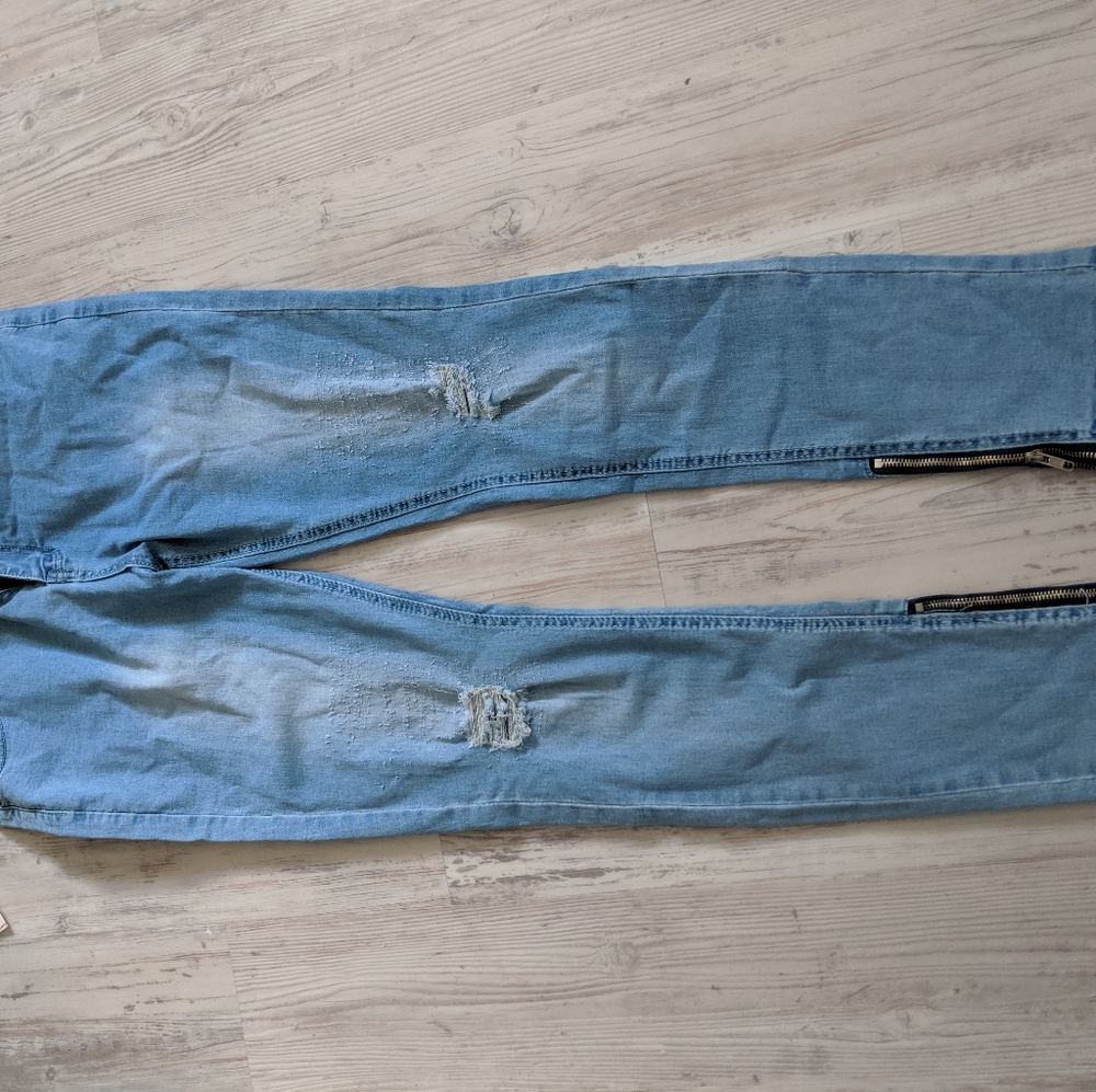 Men's ripped knee skinny jeans with zippee ankles